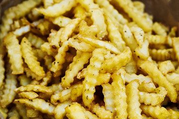French fries in paper bag, top view