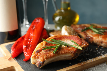 Composition with fried steaks and wine. Grilled food