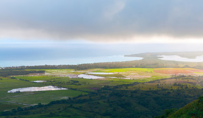 Fototapeta na wymiar Coastal Caribbean landscape at rainy sunny morning