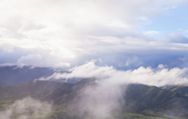 Mountain landscape under cloudy sky