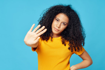 young woman showing thumbs up