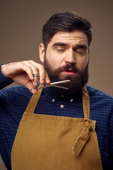 Bearded man scissors barber shop haircut
