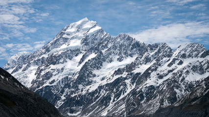 Detail shot of mountain peak (Mt Cook)  with snow and ice, made during sunny summer day in Aoraki / Mt Cook National Park, New Zealand