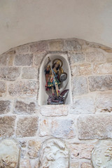 Bethlehem, Palestinian Authority, January 28, 2020: Fragment of the interior in the Milk Grotto Church in Bethlehem in Palestine. Archangel Michael fights with the dragon