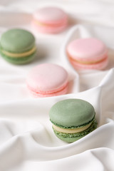 Macaroon pink and mint delicious with blueberries and strawberries and tea