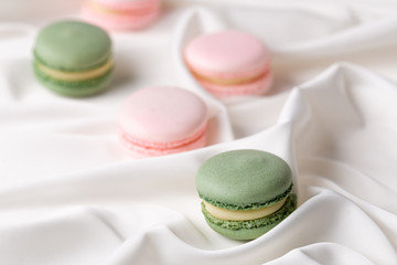 Macaroon pink and mint delicious with blueberries and strawberries and tea