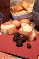 natural black truffle on table