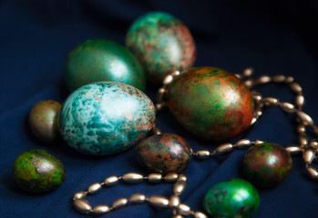 marble Easter eggs on a dark background
