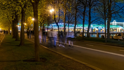 People walking in the summer evening on the city Boulevard