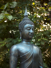 Zlin, Czech republic, February 17, 2020: buddha, statue, meditation, relaxation, statue standing in the garden