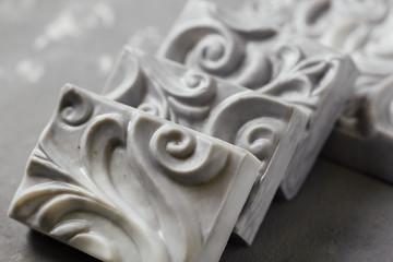 handmade soap in the form of a plaster cast with carved ornament. Huge bar of soap