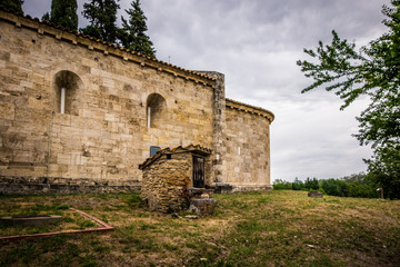 Fototapeta na wymiar Santa Maria de Porqueres romanic church in Lake of Banyoles, Catalonia, Spain.