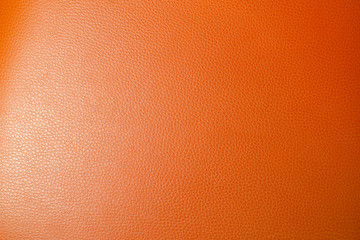 Texture of a orange leather background.