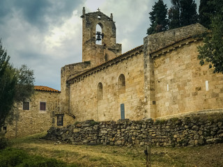 Santa Maria de Porqueres romanic church in Lake of Banyoles, Catalonia, Spain.