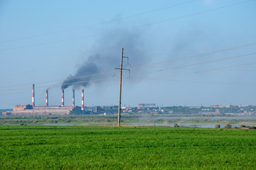 the smoke from the chimneys