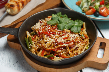 udon noodles with squid and vegetables