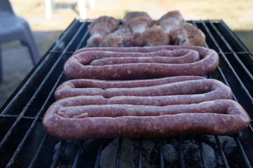 South African Braai Meat on the barbecue grill charcoal fire cooking
