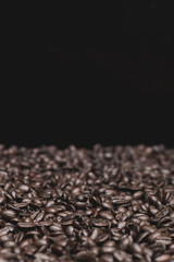 Roasted dark coffee beans background