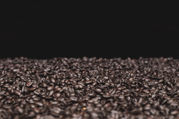 Roasted dark coffee beans background