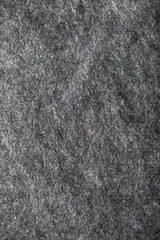 Fototapeta premium Vertical texture of gray wool fabric background