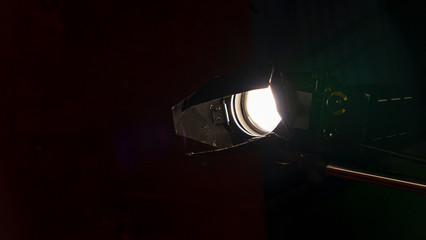 Beautiful studio light for a movie and TV show on a dark background. Professional light for the production of cinema.