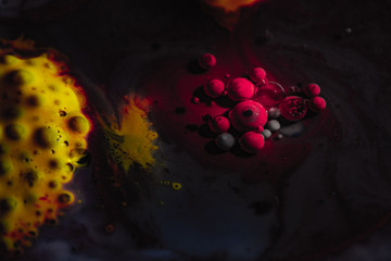Color abstraction. Creative macro photography of bubbles in liquid.