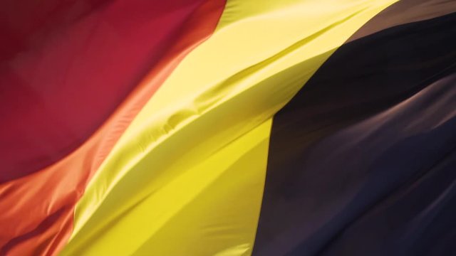Belgium flag against tricolour stripes waving on wind from Arcade du Cinquantenaire 1920X1080 HD footage (1080p 100fps FullHD video)