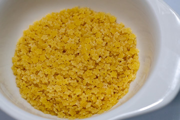 Dry stelline (little star) pasta in a small dish
