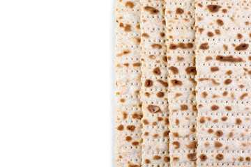 Matzah. Jewish traditional Passover bread. Pesach celebration symbol. Isolated on white. With some free space for your text or sign . Close-up.