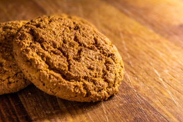 Oatmeal cookies on wooden table or chalkboard. Closeup of oatmeal cookies.