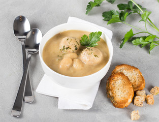 Vegan bean soup-puree with meatballs in a bowl on a light background