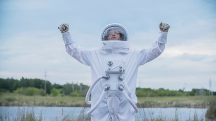 a man the cosmonaut who returned to home at earth after a space mission