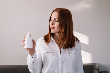 Woman using soap to clean hands