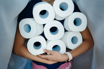 People are stocking up toilet paper for home quarantine from coronavirus.