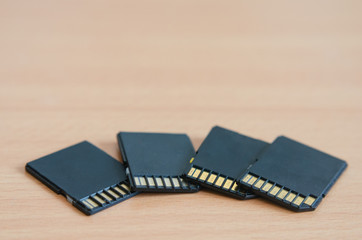 Close-up of multiple  old  sdhc  memory cards and adapters .