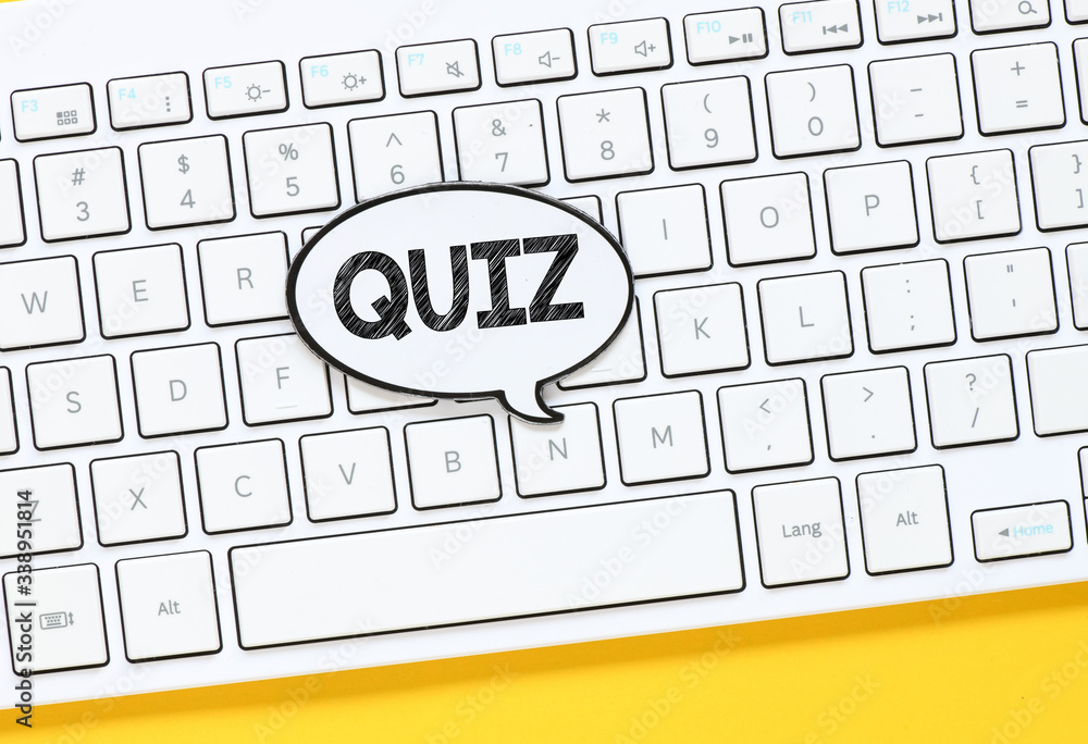 Poster quiz with speech bubbles on white keyboard background - concept.