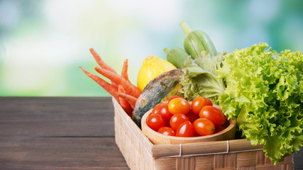 Organic vegetables in box on table and blur background, Healthy food concept.