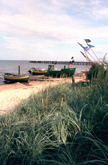 Polish fishing boats and long pier.