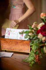 Naklejka na ściany i meble Card bin holding welcome cards for a wedding ceremony