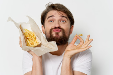 Bearded man fast food meal diet health and french fries