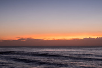 clouds and waves at dawn