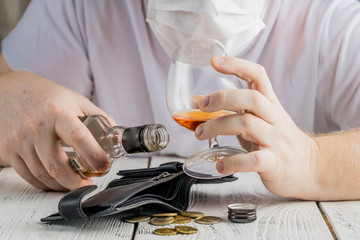 Man with alcohol Wearing Medical Mask. Corona Virus Concept