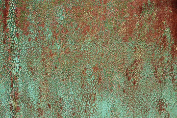Texture with covered paint. Green background with rust