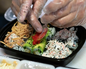 chef preparing Sushi