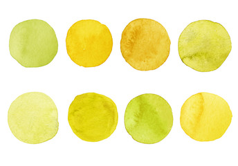 Set of yellow watercolor dots. Hand painted Spots on a white background. Round, circle. Isolated. Blobs of different color