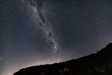 Fototapeta na wymiar Milky Way Night Sky over the top of headland
