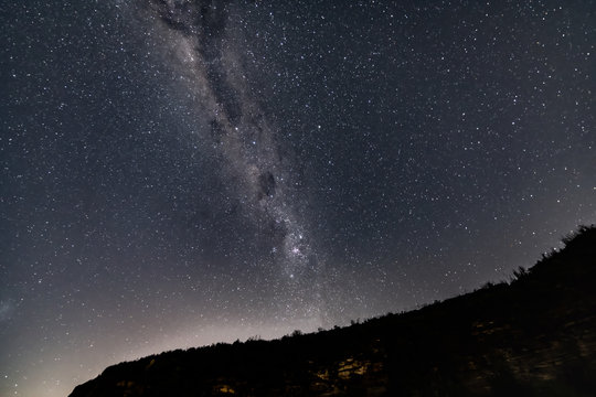 Milky Way Night Sky over the top of headland