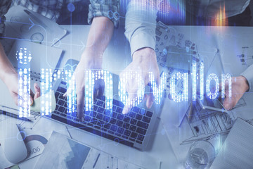 Double exposure of man and woman working together and data theme hologram drawing. Computer background. Top View.