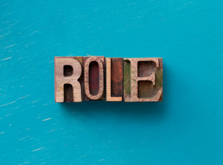 Role word written with wood type blocks