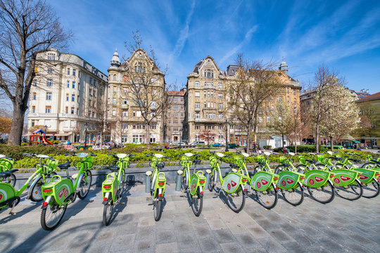BUDAPEST, HUNGARY - MARCH 30, 2019: Rent a bike station with bikes on a beautiful sunny day